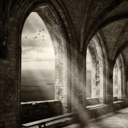 fantasy monastery archway with view to ocean an sunrays - computer manipulation