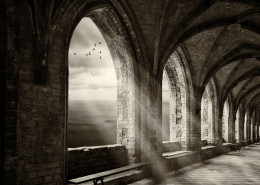 fantasy monastery archway with view to ocean an sunrays - computer manipulation